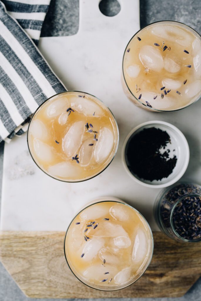 Earl Grey Latte's topped with fresh lavender. Also known as "Iced London Fog".