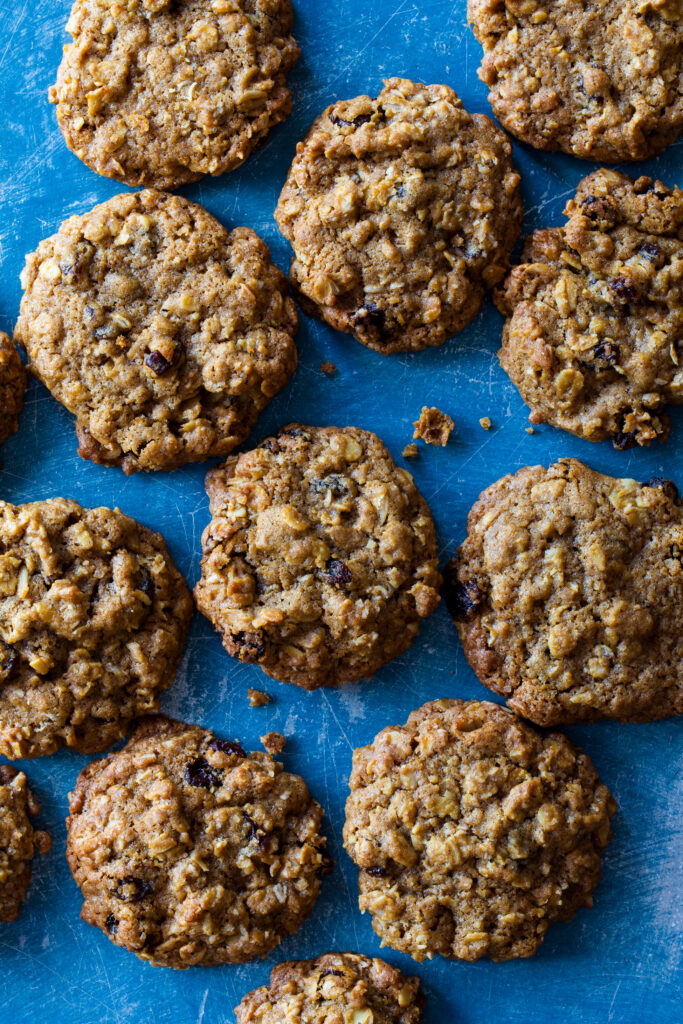 Oatmeal raisin cookie on blue background