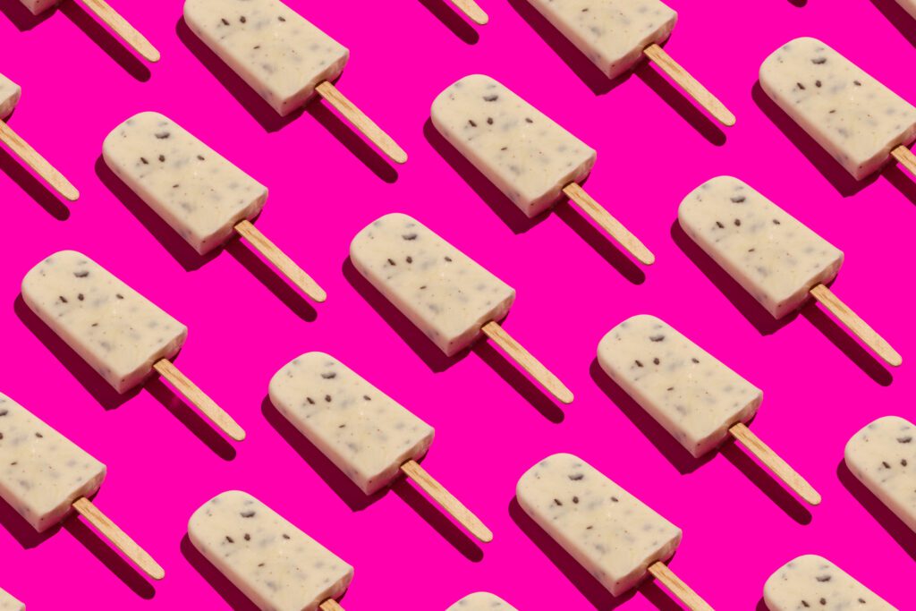 vanilla ice cream pops on pink background