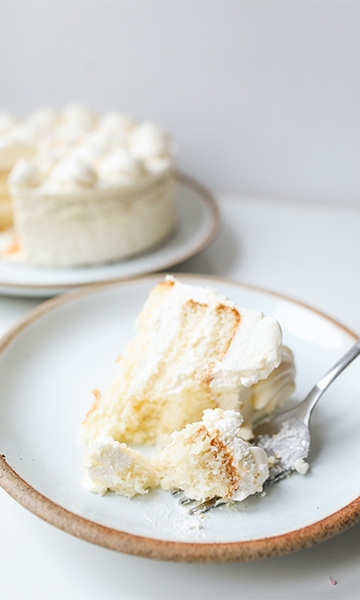 Vanilla baking flavors and extracts in a slice of layered cake