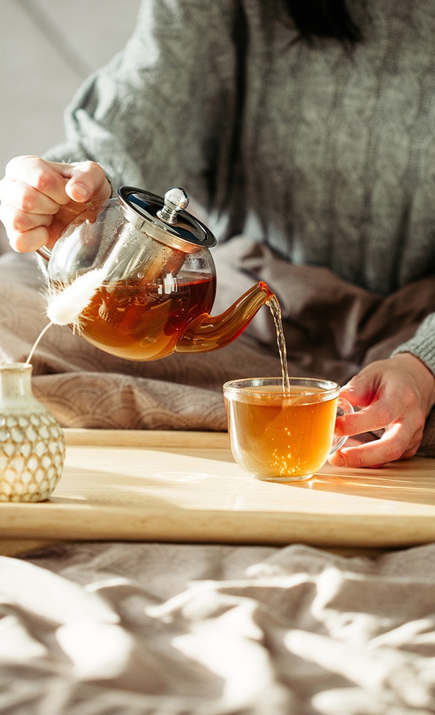 Tea flavoring poured in a hot drink